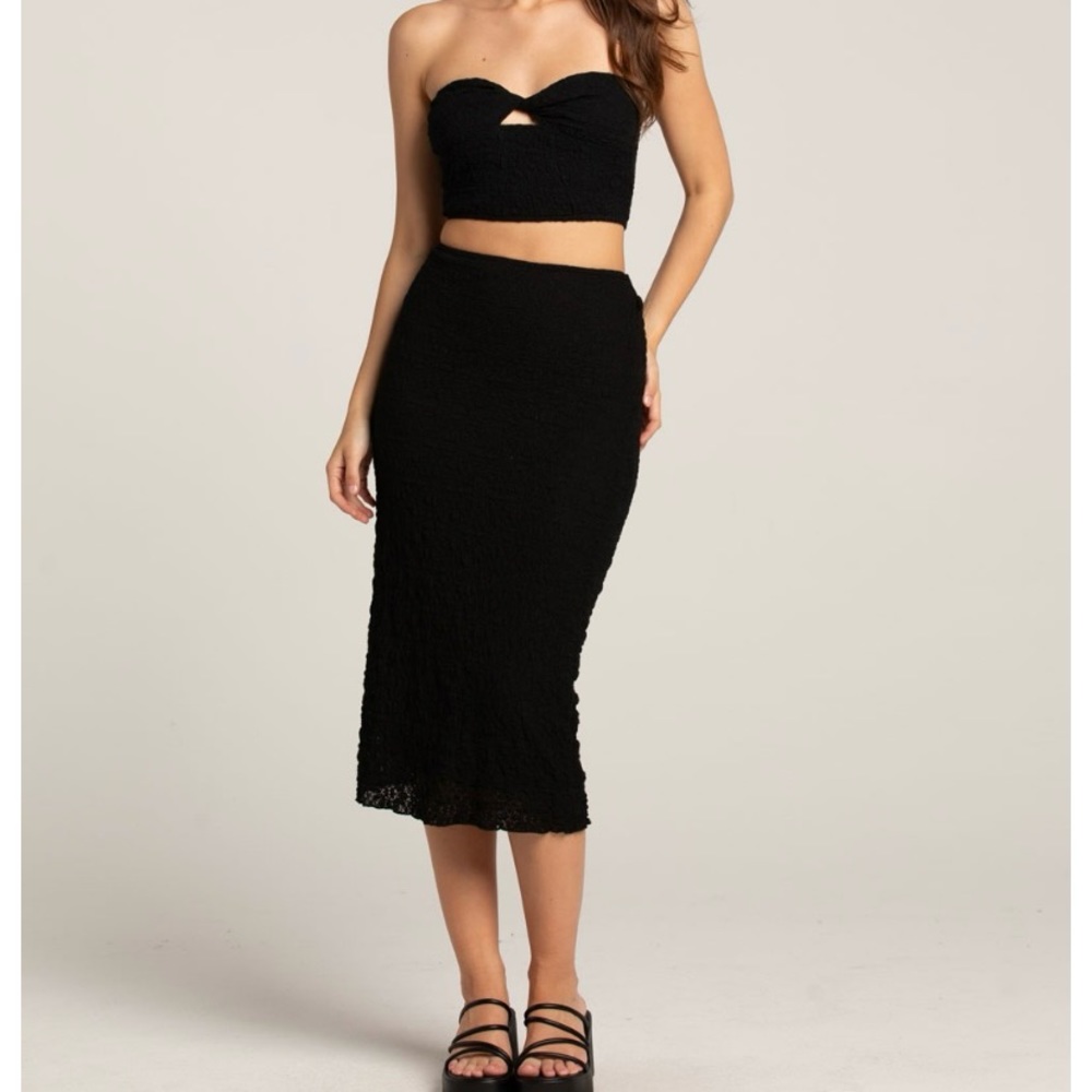 Black midi skirt with matching twist top